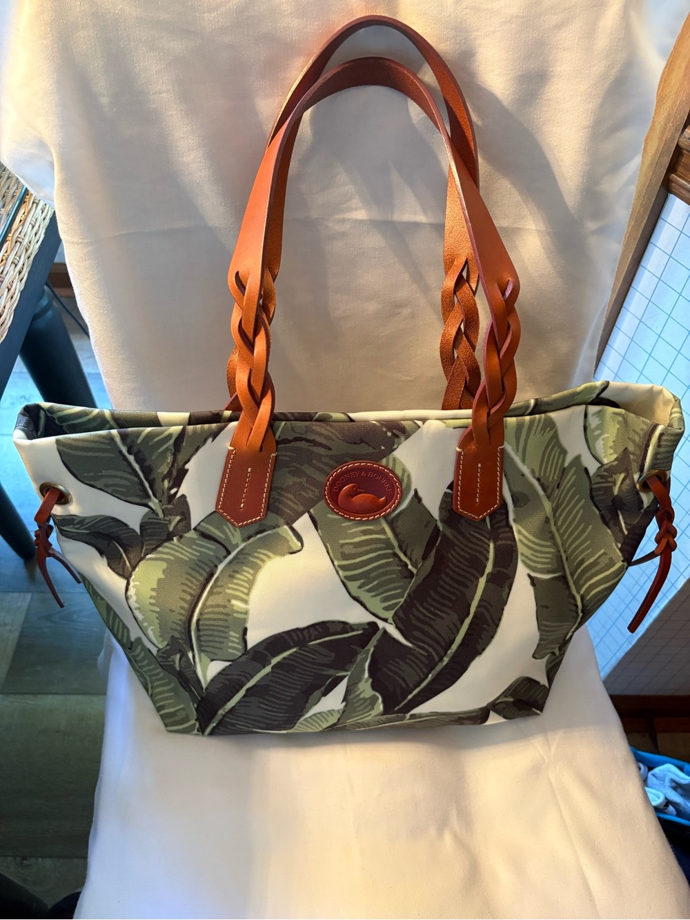 Dooney & Bourke Green Palm Leaf Tote with Brown Braided Handles Snap closure